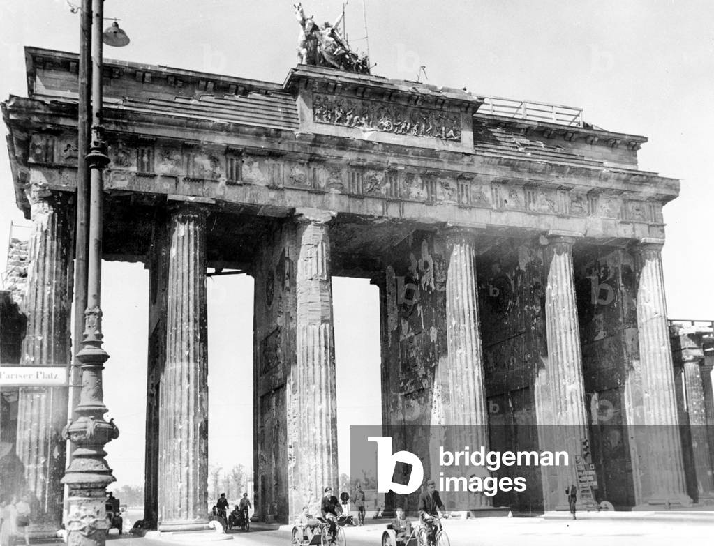bicycle-cab in Berlin used because of the oil shortage during Allied occupation 1945 here on the Brandenburg gate