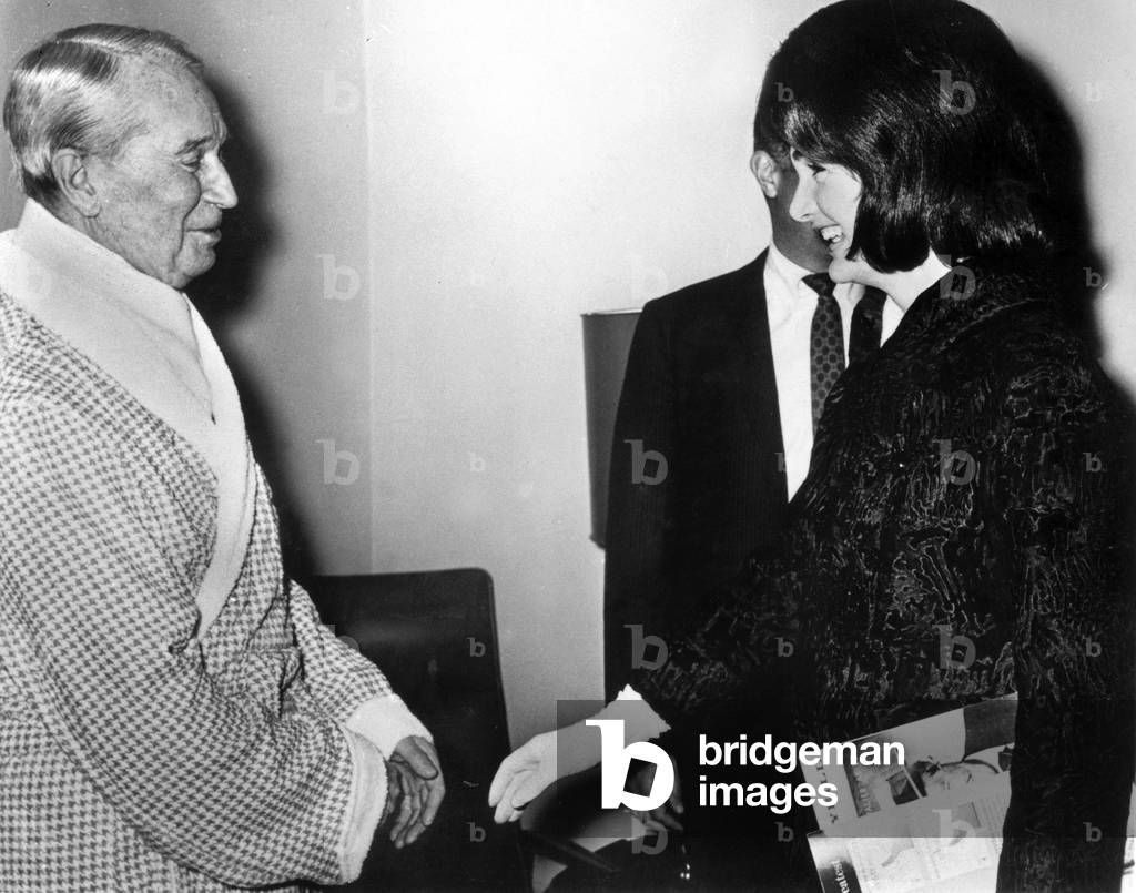Jackie Kennedy Onassis congratulating Maurice Chevalier after his show in the late 60's