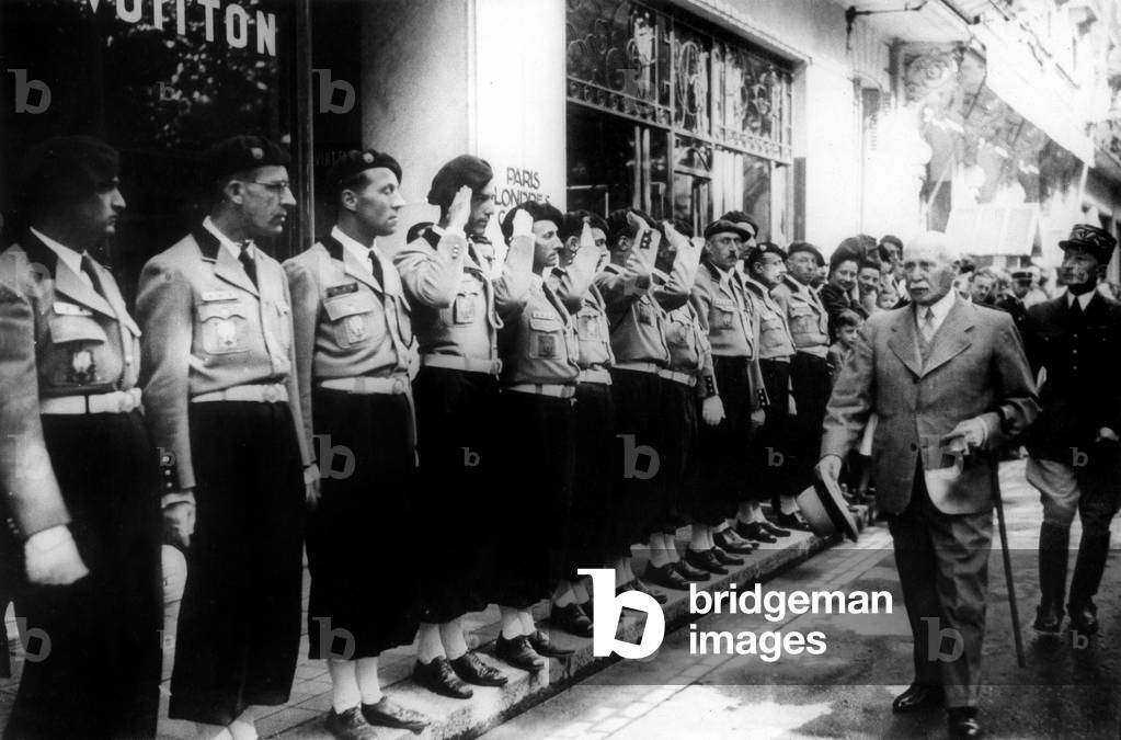 French marshal Petain reViewing the Youth Camps chieftains before flag ceremony in France