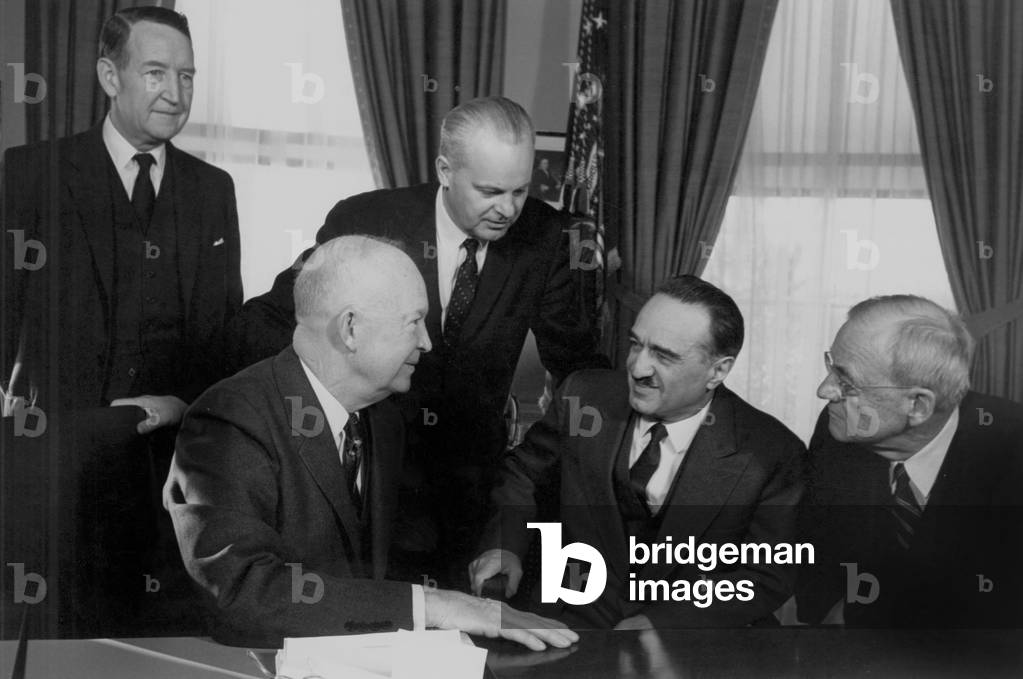 American president Dwight Eisenhower (l, seated) at the White House with soviet first deputy premier Anastas Mikoyan, american secretary of state John Foster Dulles (r, seated) and standing l-r : Llewellyn Thompson (american ambassador in USSR), Mikhail Menshikov (soviet ambassador in United States) on january 17, 1959
