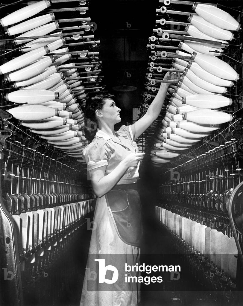 Woman working in a nylon factory (new material for parachutes) at Dupont's plant during ww2