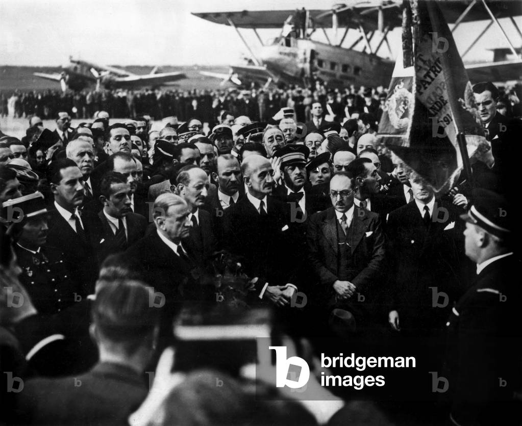 At Bourget airport, French head of government Edouard Daladier coming back from Munich agreement, saluting flag