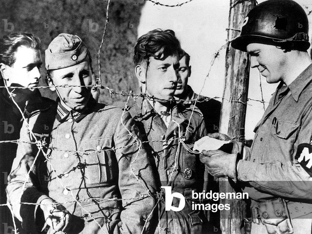 german prisoners watched by american soldier in Carrocceto zone during italian campaign 1944