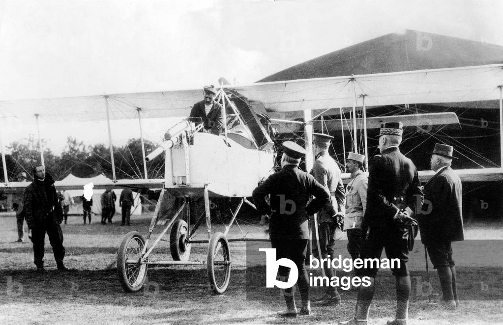 Maneuvre of biplane with 37mm cannon gun at Malzeville near Nancy east of France around 1914 (r-l) French president Raymond Poincare belgian king Albert 1st general Gerard and French minister of war Alexander Millerand