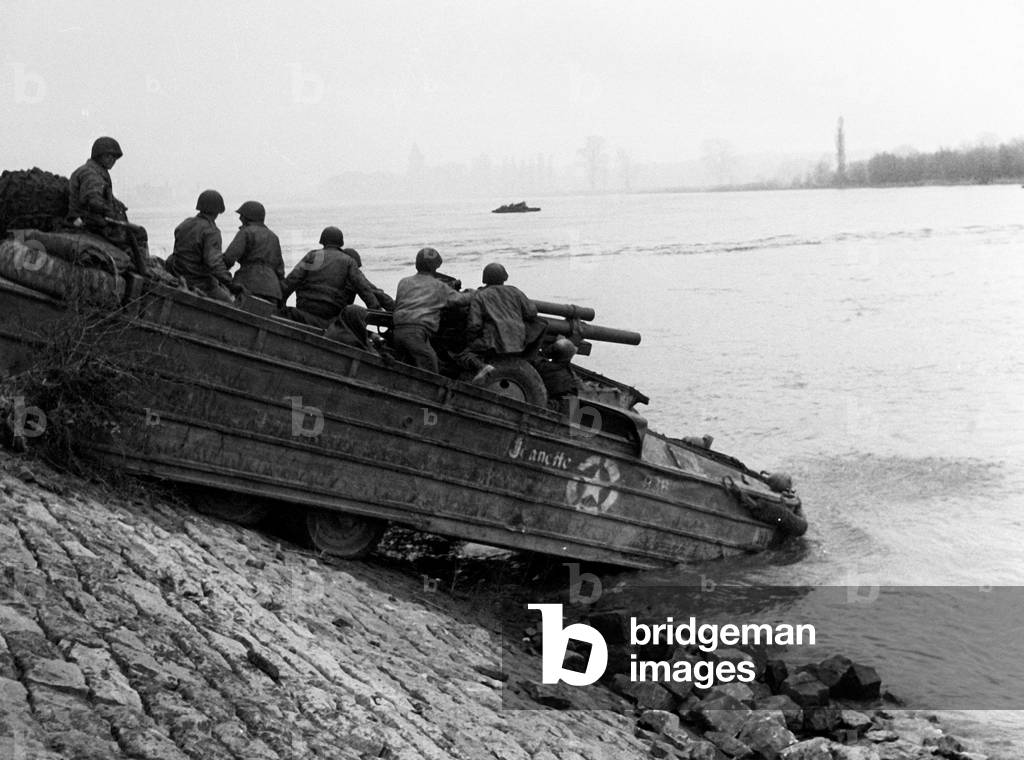Crossing the Rhine : the seventh US army artillery cross the River with a 