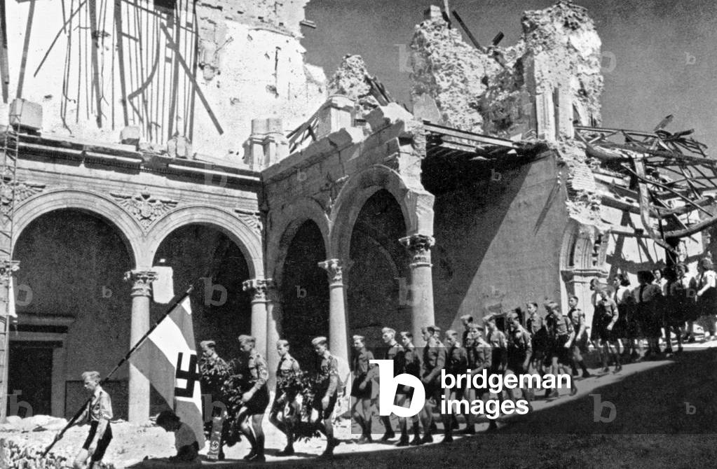 German Hitlerjugend in Spain here amond the ruins of the Alcazar of Toledo in 1938 during the Spanish civil war. 1760 nationalists have entrenched themselves in Alcazar of Toledo and resisted to republican assaults during 2 monts (july-september 1936) before being liberated byFranco