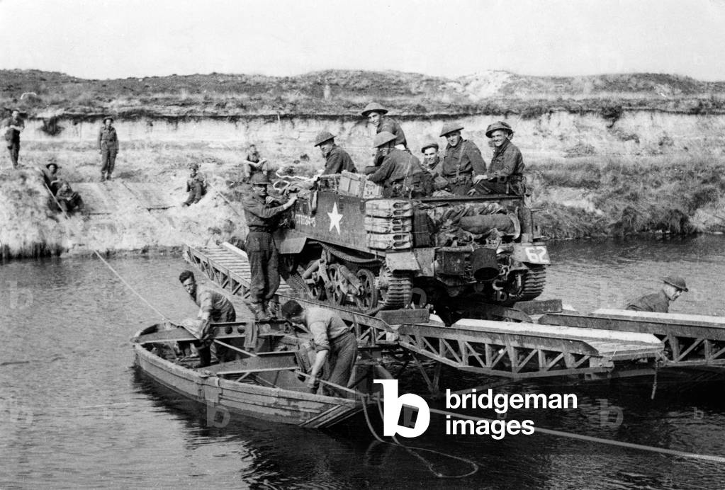 English universal carrier crossing Maas Waal canal in Holland on a ferry 1944