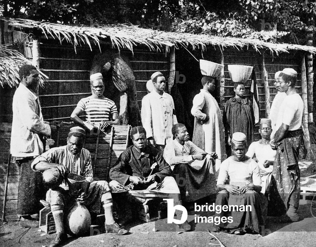People in Cameroun posing with traditionnal suit, 20's (german colonization)