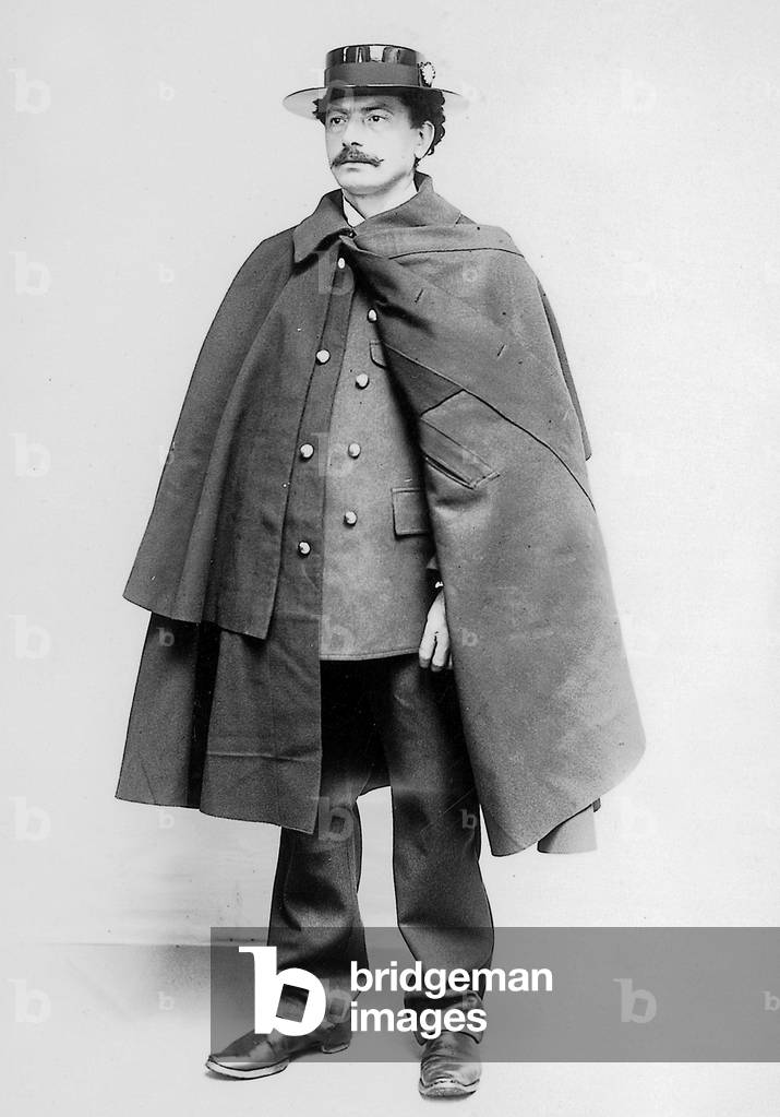 coachman wearing cape and hat in 1905