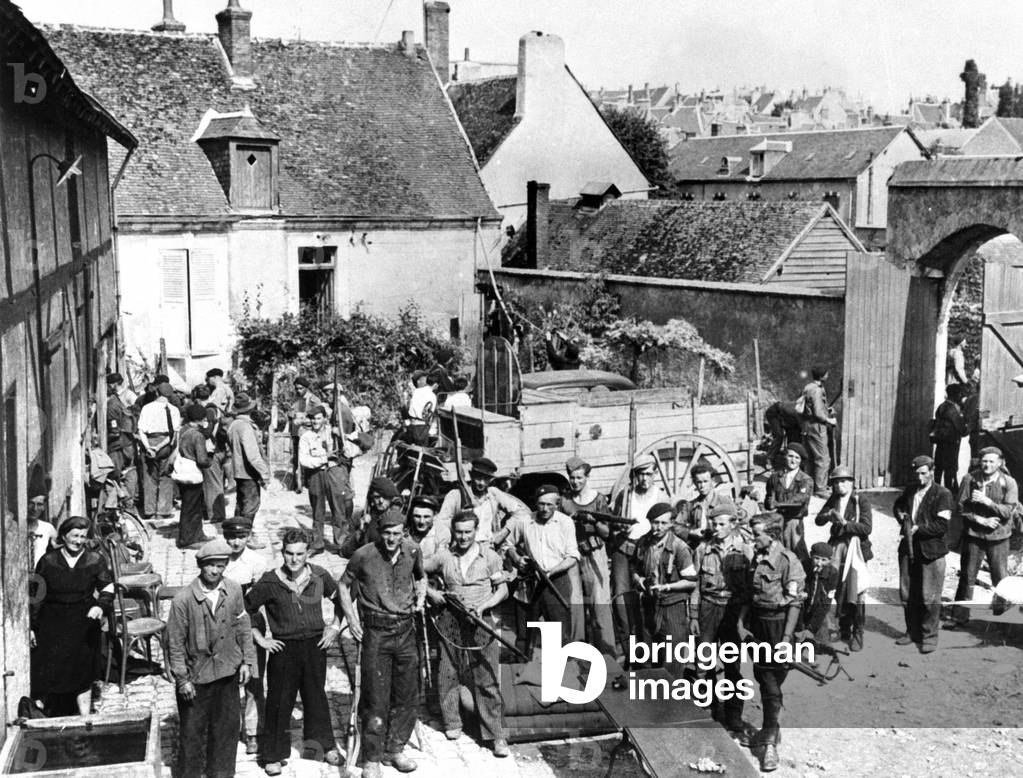 The FFI (French Forces of the Inerior) in the city of Orleans . This city of Orleans was liberated by US troops aug 18 1944