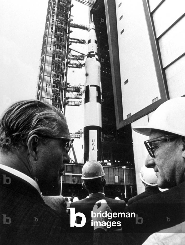 Werner von Braun (l, 1912-1977) and Willy Ley (1906-1969) american space experts and engineers (of german origins) here in front of rocket Saturn V in 1967