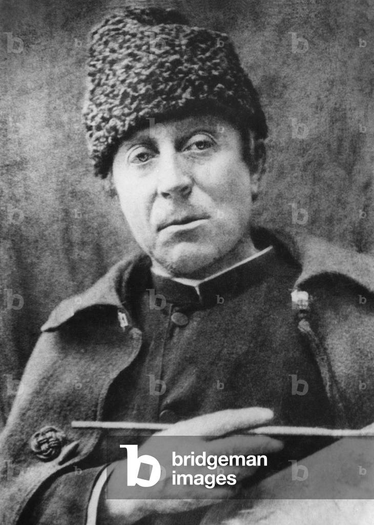 Paul Gauguin (1848-1903) French painter here with palette and brush c. 1900
