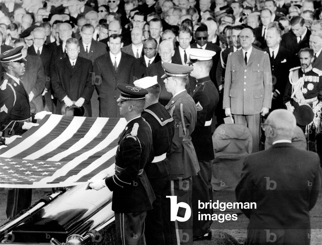 Funeral of american president John Fitzgerald Kennedy at Arlington National Cemetery in Washington on november 25, 1963 : the coffin with american flag, French president Charles de Gaulle and Haile Selassie