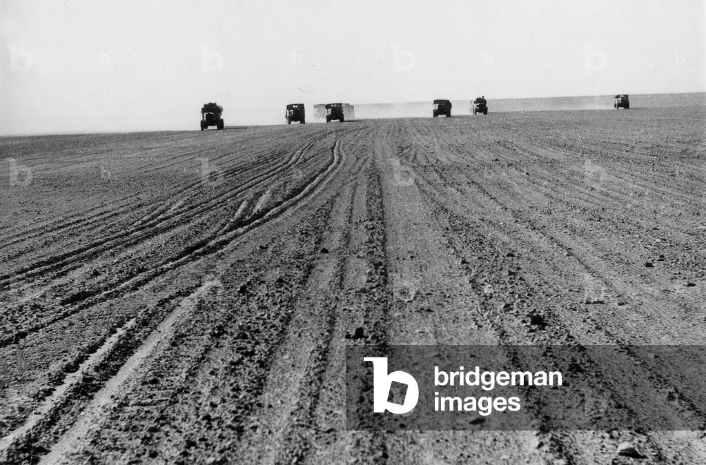 French trucks in the desert on the trail of Sebah, Fezzan, Libya, 1947