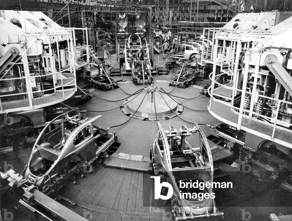 Assembly line for Bug Beetle car in Volkswagen factory plant c. 1950