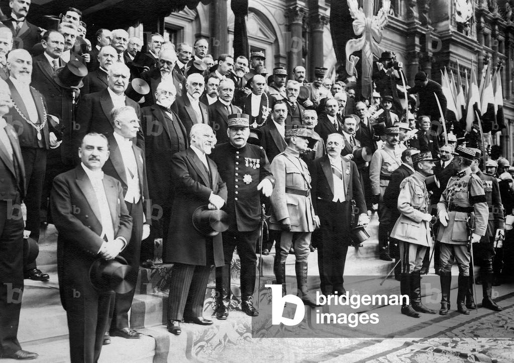 French president Raymond Poincare, with officers Joffre and Foch at military honours ceremony in Paris for distinguished regiments july 14, 1919 during the Victory celebrations