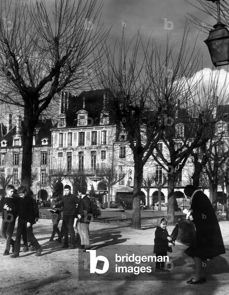 the Place des Vosges (Vosges Square) in Paris in the 50's