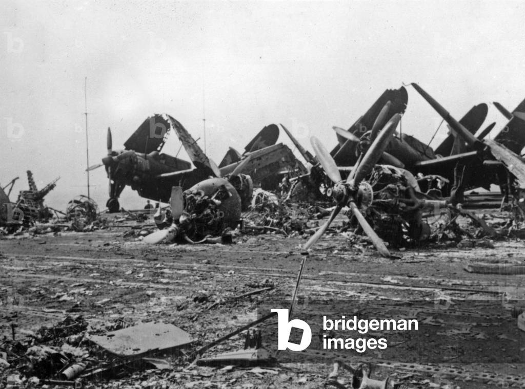 Planes on fligh deck of Bunker Hill after 2 kamikaze plane hits, may 11, 1945