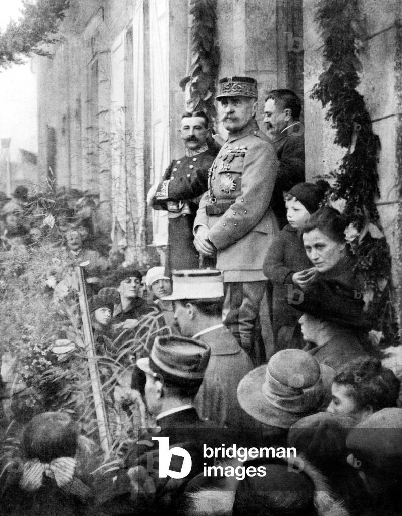marshal Foch on the doorstep of his father's house in Valentine village (southeast of France) with inhabitants, ministerial representative and the mayor