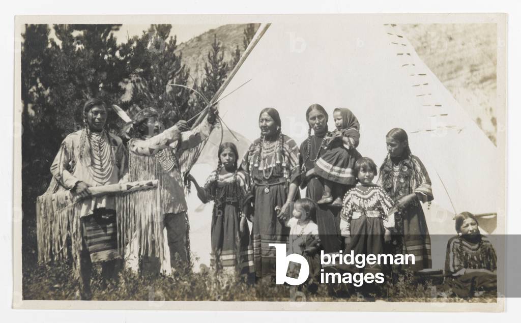 Untitled (Two Chiefs, Three Women, and Five Children in front of a Teepee), c.1900 (gelatin silver print)