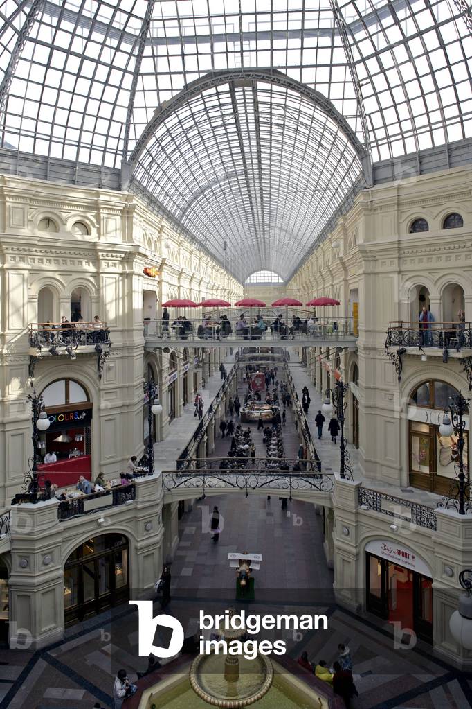 The Gum department store, one of the largest stores in Russia, stretches 252 metres long and 88 metres deep. It consists of three passages joined together by corridors and bridges and covered by a large glass that lets the light filter. Built in 1894, on Red Square, Moscow (Russia)