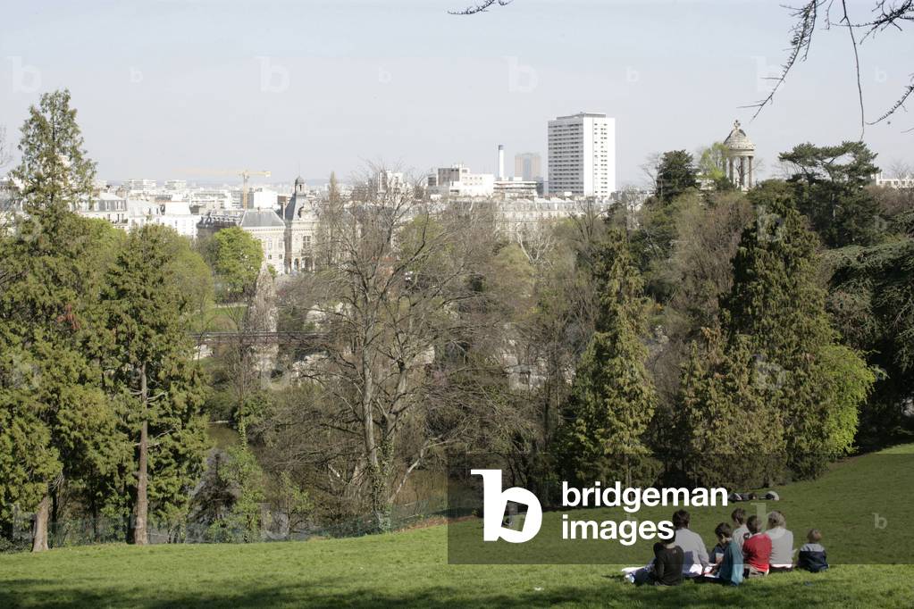 The Parc des Buttes Chaumont, Paris 19th arrondissement. On the will of Napoleon III (1808-1873) to offer the laborious classes green lungs, the park was brought to old gypsum quarries, which explains its topography. Adolphe Alphand (1817-1891), grand authorizer of Parisian parks with architect engineer Alfred Darcel (1818-1893) drew up the plan of the park. The landscape artist Pierre Barillet Deschamps (1824-1873) planted the park from 1866. Gabriel Davioud (1824-1881) built the restaurant, the guard house, the brewery and the Sibyl temple. Photography 2005.