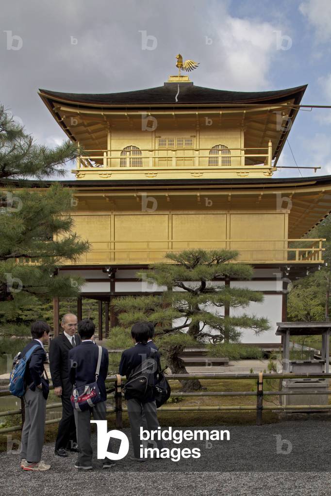 Kinkaku-ji Temple, a gold-covered building, in Kyoto, Japan.