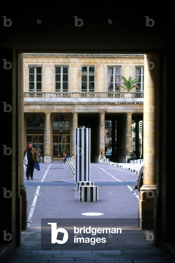 The columns of Daniel Buren, Jardins du Palais Royal, Paris. The columns that grid the court were added in 1986 following a public order from the Ministry of Culture.