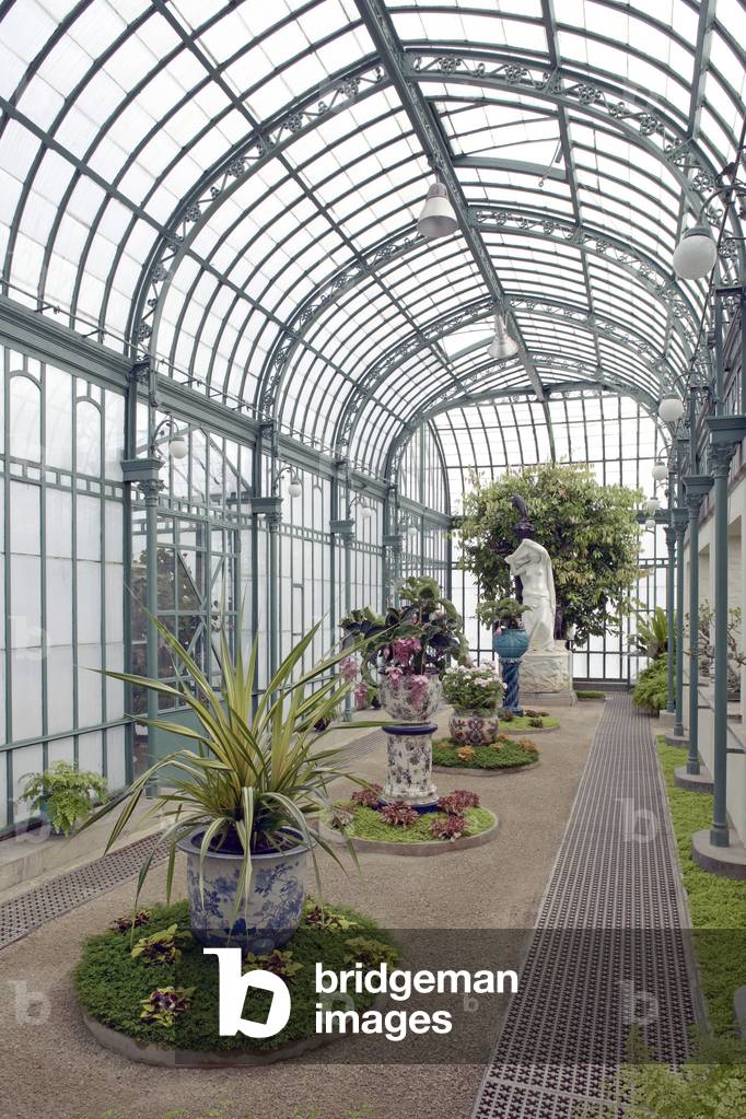 The royal greenhouses of Laeken in Belgium. Achievement 1873. In the 19th century, glass and metal, as new building materials, allowed the construction of a new type of building: the greenhouse. King Leopold II (1835-1909) entrusted the architect Alphonse Balat (1819-1895) with the construction of an ideal glass palace. Open to the public three weeks a year, the Royal Greenhouses of Laeken house an exceptional collection of plants, some dating back to Leopold II. Photography 30/04/06.
