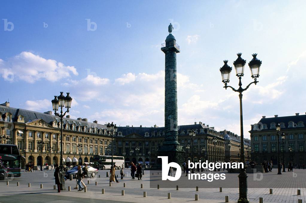 Place Vendome in Paris. The one we know today dates back to 1699 and was designed by Jules Hardouin Mansart. And it was only with the piercing of the Rue de la Paix that the Vendome Column was built in 1806 by Napoleon to the glory of the winners of Austerlitz. An admirer of Roman Antiquity, the Emperor took as model the Trajane column raised in Rome and erige his statue of Napoleon imperator by Chaudet. After the regime changes, Napoleon III installed a copy of the Emperor's statue by Dumont.
