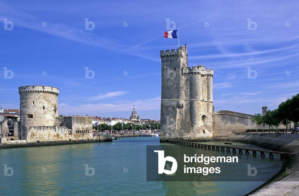 The Chaine and Saint Nicolas towers at the entrance of the old port of La Rochelle (Charentes Maritimes).