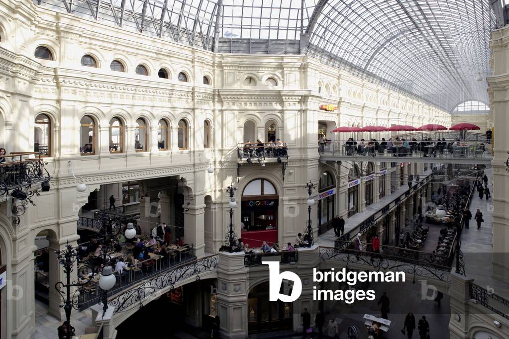 The Gum department store, one of the largest stores in Russia, stretches 252 metres long and 88 metres deep. It consists of three passages joined together by corridors and bridges and covered by a large glass that lets the light filter. Built in 1894, on Red Square, Moscow (Russia)