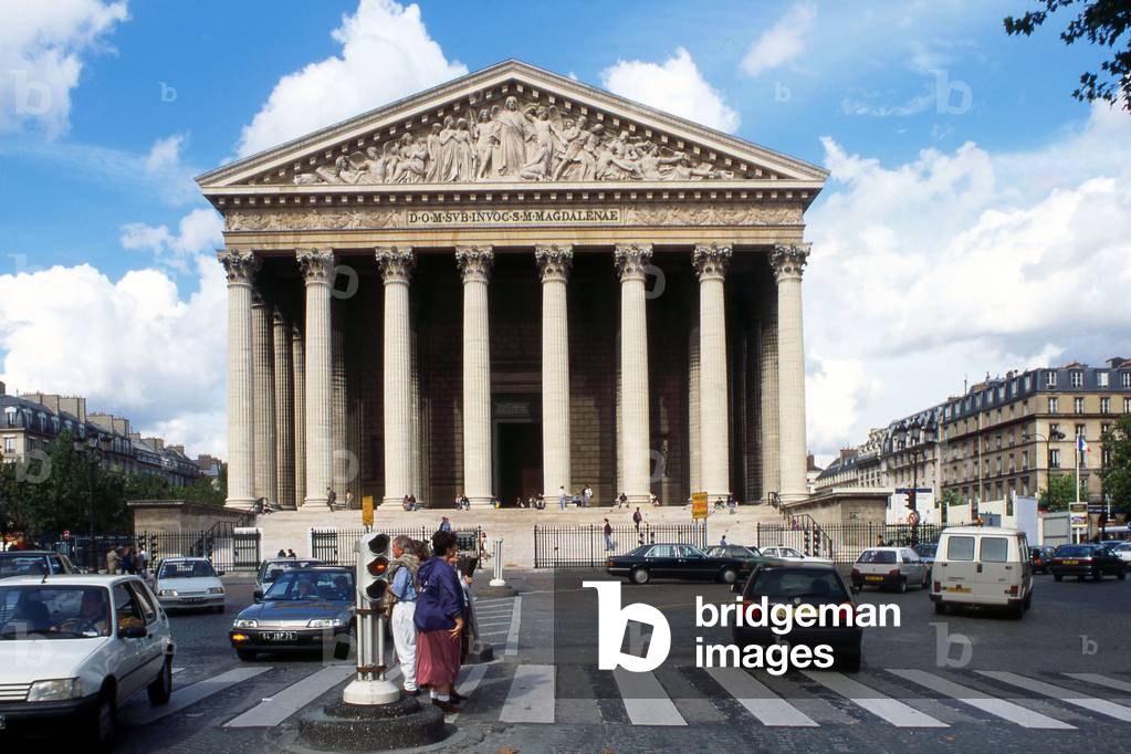 L'Eglise de La Madeleine, Place de la Madeleine, Paris 8th arrondissement. Its construction lasted nearly a century. Subject to political aleas, it was finally Napoleon (1769-1821) who entrusted Pierre Vignon (1763-1828) with the task of building an ancient temple dedicated to his military glory. Only the Restoration restored its religious vocation to the Church of Sainte Marie Madeleine in 1842, architect Charles Girault (1851-1932).