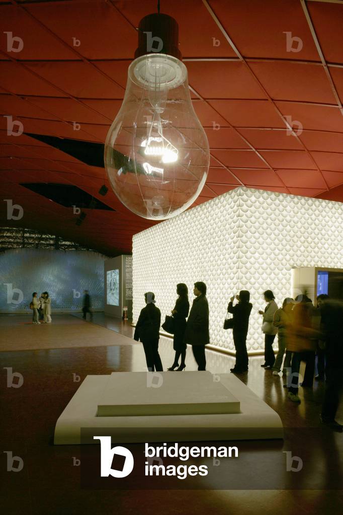 The island of Chalon sur Saone, (Les Iles du Reel), in the French pavilion of the Aichi World Exposition in Japan, 2005. The artist Lilian Bourgeat has suspended a gigantic light bulb of 50 meters in diameter that only lights up under the combined push of several visitors. At the origin of this project, the city of Chalon sur Saone, which has partnered with a non-governmental organization, W.W.F, the agency for the environment and the management of energy as well as the house of the environment to demonstrate that at the scale of a territory it is possible to reduce greenhouse gas emissions more efficiently than do not provide for this in the Kyoto agreements.