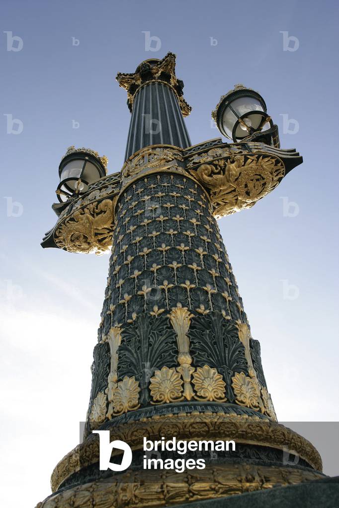 Rostrale column, Place de la Concorde in Paris, 75008. Designed by Jacques Ange Gabriel as a French garden, it is one of the most beautiful French squares. Inaugred in 1763 as Place Louis XV, it became the place of the Revolution in 1792 and became the place of the capital executions. Louis-Philippe will give it back its current name. In 1836 he called the architect Hittorf to reshape the square with the eight statues of the big cities of France and the fountains
