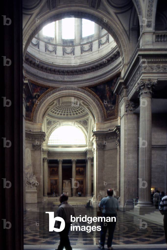 The Pantheon in Paris. Construction 1757-1790, architect Jacques Germain Soufflot (1713-1780). In 1744 Louis XV, suffering from a serious illness in Metz, would wish to erect an immense church instead of the abbey of Sainte Genevieve, which was then in ruins. When the war came, he kept his word and assigned the architect Soufflot the task of drawing the plans of the monument. A great admirer of Greek Roman architecture, he imagined a gigantic building, built on a plan of Greek cross 110 metres long, 84 metres wide and 83 metres high. At the time, the project seemed so insane that many, in the court and in the salons of the capital, would question Soufflot's abilities and prevent the collapse of the monument. Louis XV confirmed his confidence in the architect and laid the foundation stone in 1764 during a grand ceremony. In 1806, the Pantheon, like all the churches in France closed during the revolution, was restored to its original name of Sainte Genevieve church. Renamed Pantheon in 1830, the building regained its vocation as a laique and patriotic temple. Headquarters to the insurgents of the Commune in 1871, during which Milliere was shot on the steps, the building was definitively transformed into a Republican monument in 1885, during the funeral of Victor Hugo.