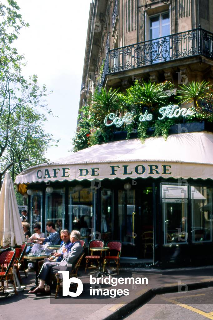 Le Cafe de Flore, 172 boulevard Saint Germain, Paris 6th arrondissement. The Cafe de Flore appeared at the beginning of the 3rd Republic, probably in 1887. It owes its name to a sculpture of the little deity standing on the other side of the boulevard. At the end of the 19th century, Charles Maurras installed on the first floor, redigested his book Sous le signe de Flore