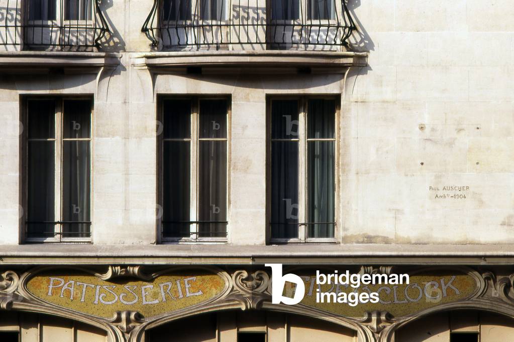 The Felix Potin building, 140 rue de Rennes and rue Blaise Desgoffe, Paris 6th arrondissement. Built in 1904, made of reinforced concrete by the architect Paul Auscher (1866-1932), this seven-storey building consists of supply shops and sales to the public (ground floor and floor), offices and housing on floors. The corner turret is crowned with an evide bell tower where you can read the name of Felix Potin.