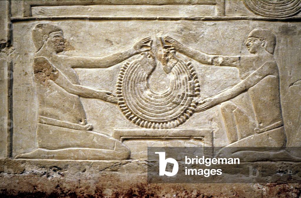 Ancient Egypt: Saqqarah (or Saqqara or Sakkarah): necropolis of the Old Empire. Detail of the reliefs depicting two jewelers.