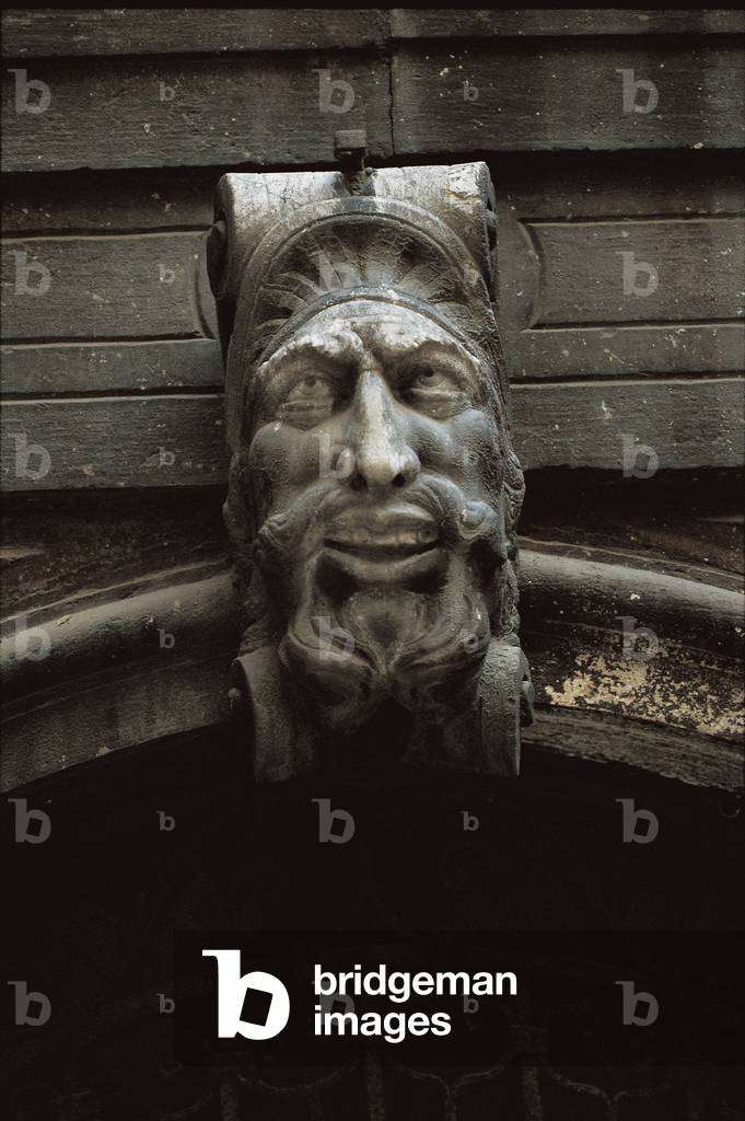 Sculpture over a doorway in the courtyard of Palazzo Pisani, the Benedetto Marcello Music Conservatory, Venice, Italy (photo)