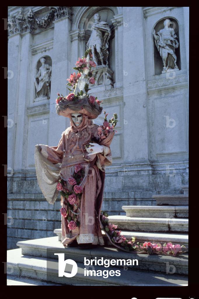 Carnival Figure on the Steps of Santa Maria della Salute, Venice (photo)