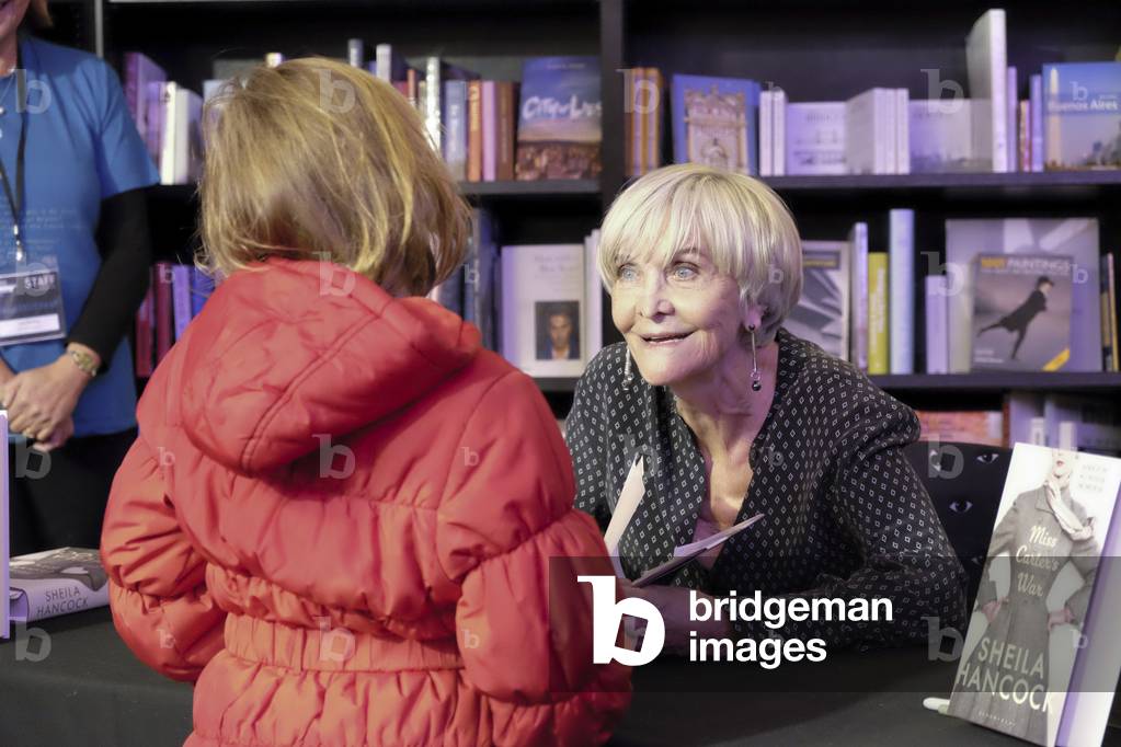 Sheila Hancock signs copies of her latest book at the Cheltenham Literature Festival, 2014 (photo)