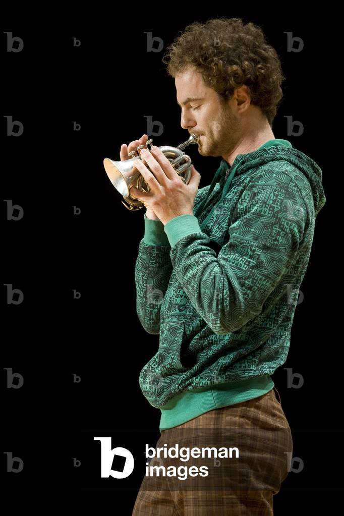 Boris Charmatz, dancer with a pocket cone. Grande Halle de la Villette, Paris. Photography festival jazz a la villette 2008