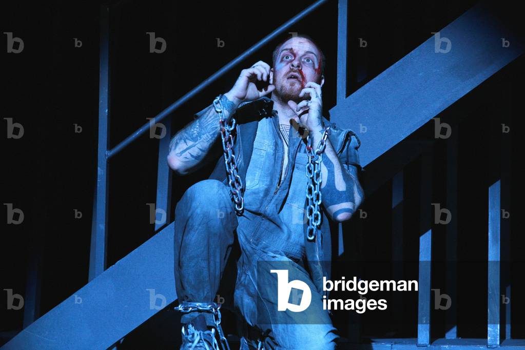 Evgeny Nikitin interpreting Il Prigioniero. The prisoner, opera by Luigi Dallapiccola at the Opera Garnier, April 2008. Orchestre de l'Opera de Paris conducts by Lothar Zagrosek and directed by Lluis Pasqual. Photography