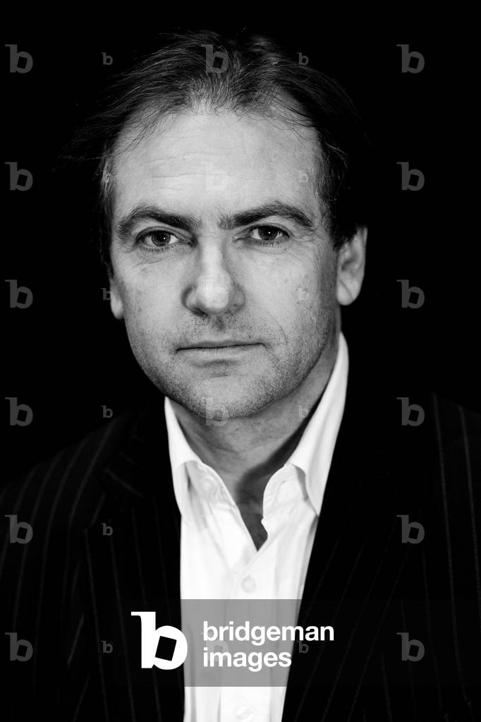 Portrait of Belgian writer Didier van Cauwelaert. March 2012. by Frederique Toulet, b/w