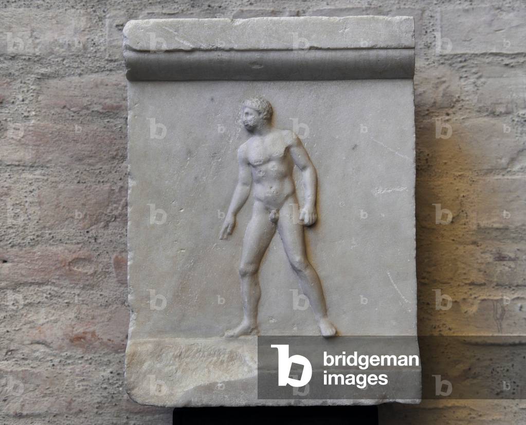 Greek art. Relief from a statue base with spear thrower after the throw. About 380 B.C.