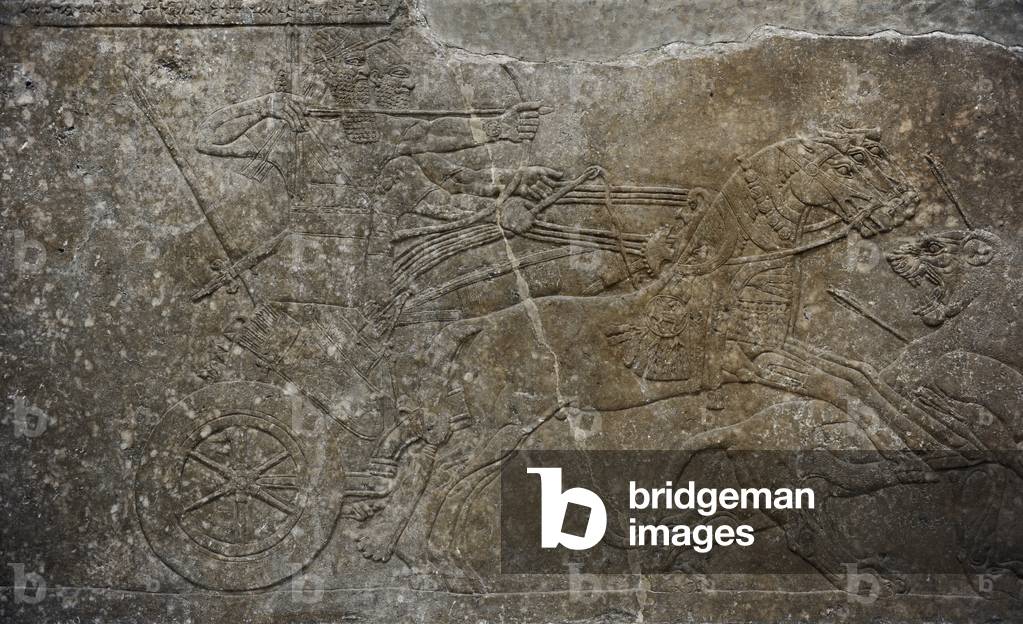 Mesopotamian art. Assyrian. Relief of the palace of Ashurnasirpal II or Northwest Palace at Nimrud. Alabaster. Dated 883-859 B.C. It depicts the lion hunt. Pergamon Museum. Berlin. Germany.