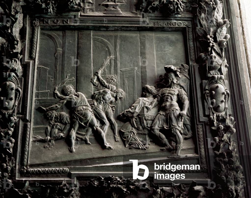 Italy. Pisa Cathedral. Flagellation of Christ. Detail of the main gate. 17th century.