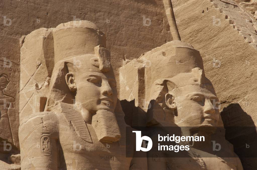 Egyptian art. Great Temple of Ramses II. Two colossal statues depicting the pharaoh Ramses II (1290-1224 BC. Abu Simbel. Egypt.