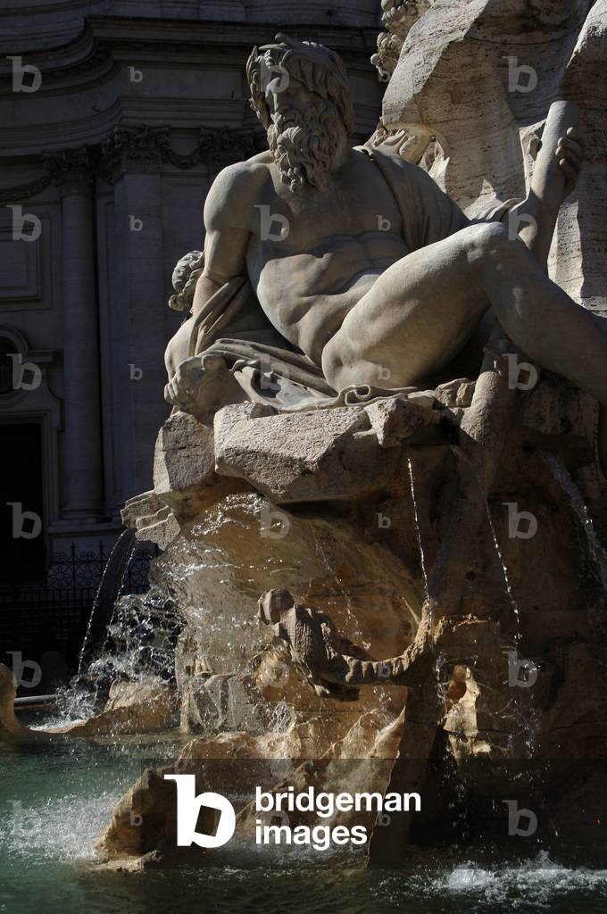Fountain of Four Rivers, 1651, by Bernini. The river-god Ganges. Piazza Navona, Rome, Italy.